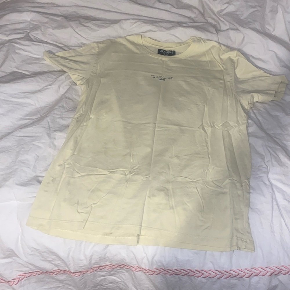 Large shirt yellow tee